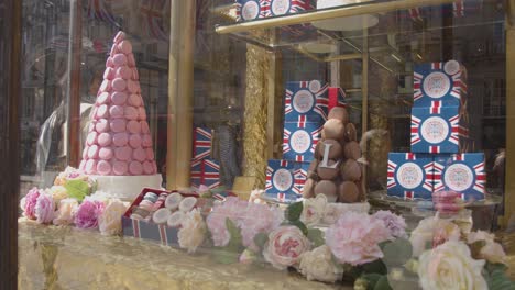 Shop-Window-Display-Of-Macarons-Celebrating-Coronation-Of-King-Charles-The-Third-In-London-UK